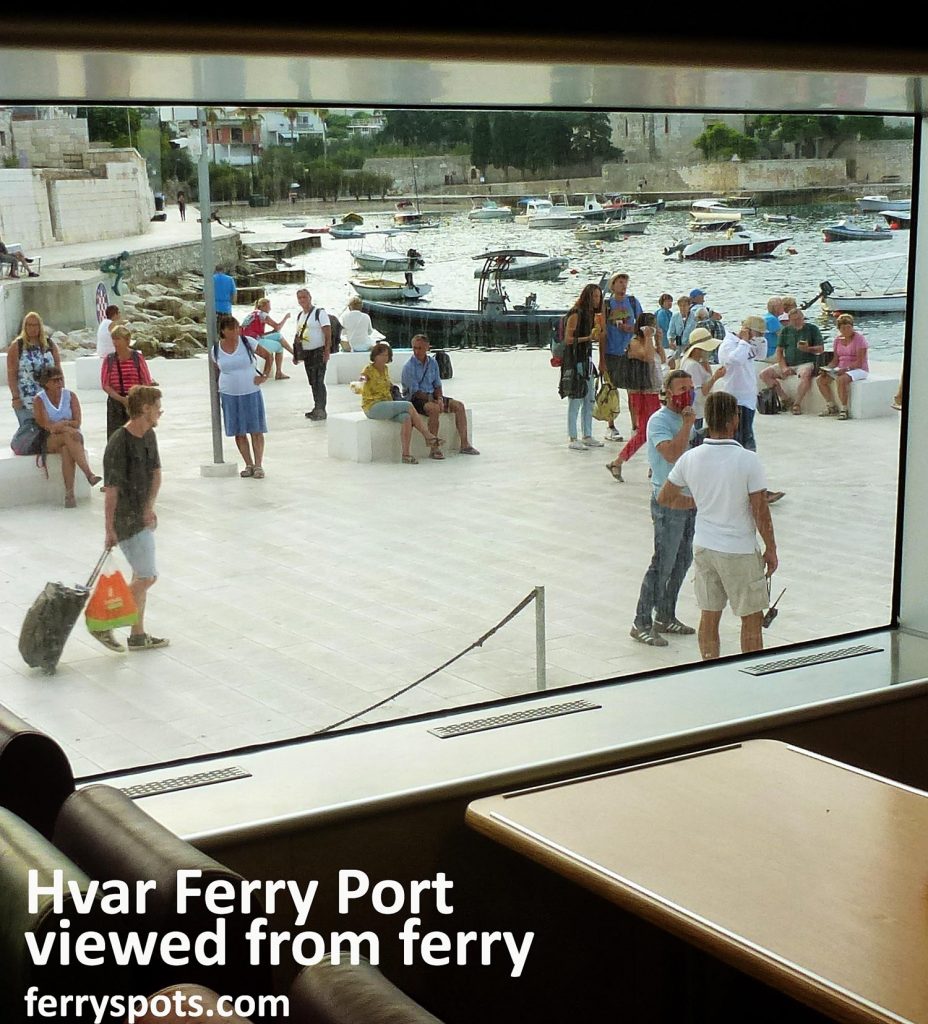 Views over the Hvar ferry port from inside the fast catamaran ferry